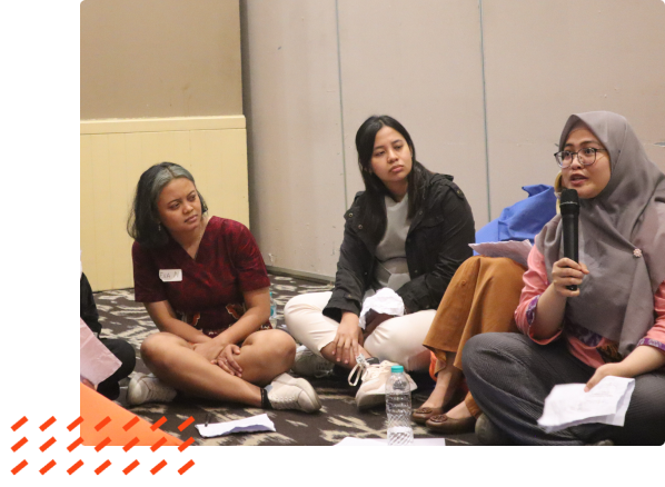 Women speaking at an event
