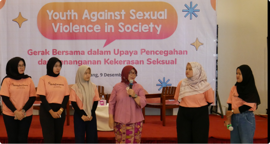 Group of women speaking to an audience