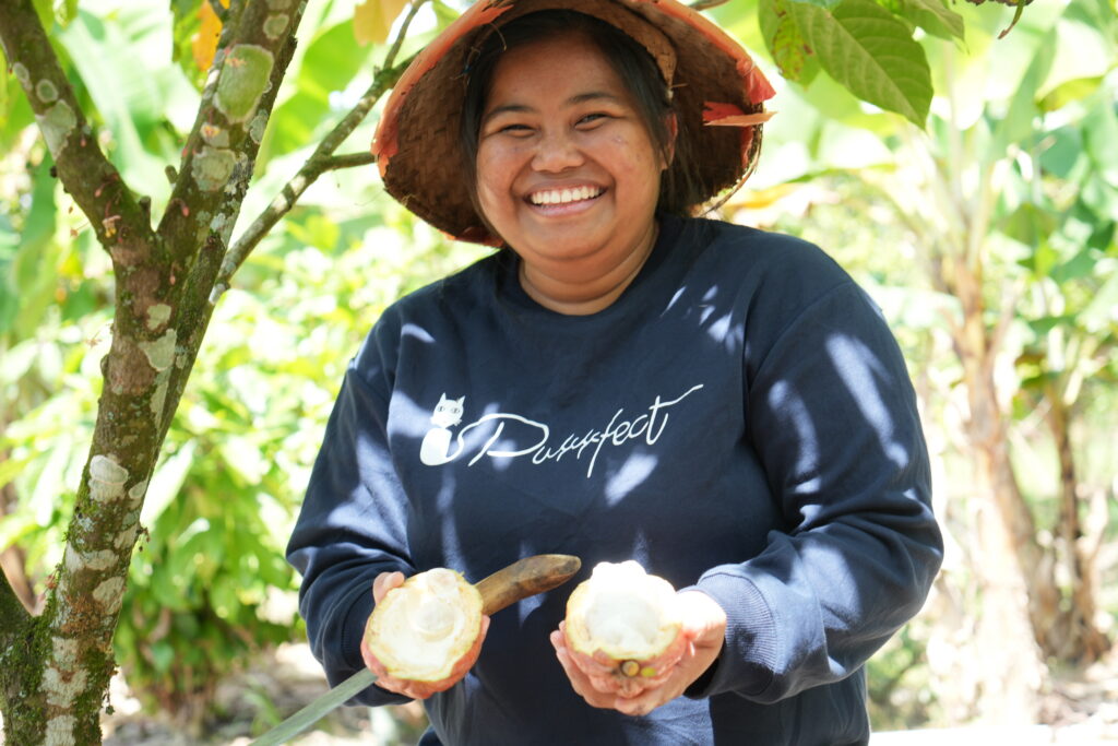 A woman holding fruit